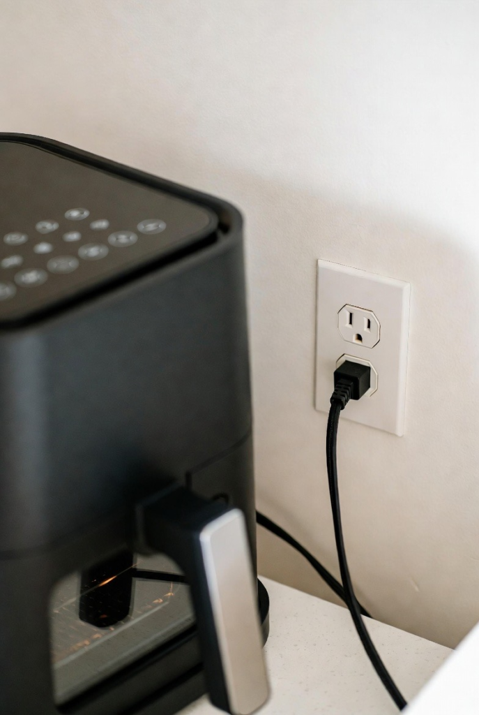 air fryer plugged into the power source