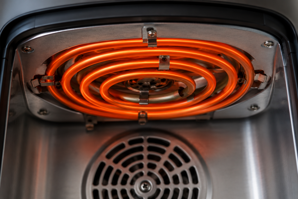 A clean heating element should glow evenly and be free of heavy grease buildup